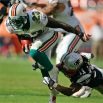 capt.813b367d956a42a6a6a54cb94265c42f.patriots_dolphins_football_mds121.jpg