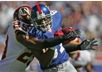 capt.05db0751a5d44d6c8dccf8e7c37c1af7.redskins_giants_football_eru203