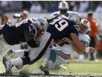 capt.ffb1e2c916bd467cb11be8a19fb7d6f7.aptopix_dolphins_patriots_football_mawt103